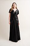 curvy model wearing Camilla bridesmaid dress in black.