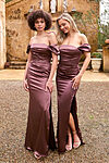 ania Olsen Cannes Bridesmaid Dress in Marine satin with sweetheart neckline, off-the-shoulder sleeves, thigh-high split and fitted silhouette, photographed in studio.