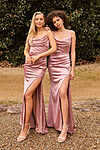 Model wearing the Tania Olsen Cassis bridesmaid dress in Champagne, featuring a scoop neckline, frill detail and floor-length A-line skirt