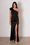 Model wearing the Kiko bridesmaid dress by Tania Olsen in light satin, featuring a one-shoulder neckline with tiered flute sleeve, draped waist, and A-line skirt with high-leg split.
