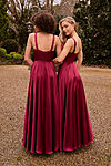 Tania Olsen Marseille bridesmaid dress in wine, featuring a corset-style bodice, V-neckline, and A-line skirt with thigh-high split, photographed in studio lighting.