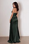 Model wearing the Thaliah bridesmaid dress by Tania Olsen in light satin, featuring a strapless bodice with draped detailing and floor-length A-line skirt with front split.