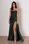 Model wearing the Thaliah bridesmaid dress by Tania Olsen in light satin, featuring a strapless bodice with draped detailing and floor-length A-line skirt with front split.