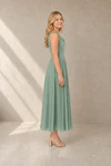 Sage Green Athena junior bridesmaid dress by TH&TH, side view