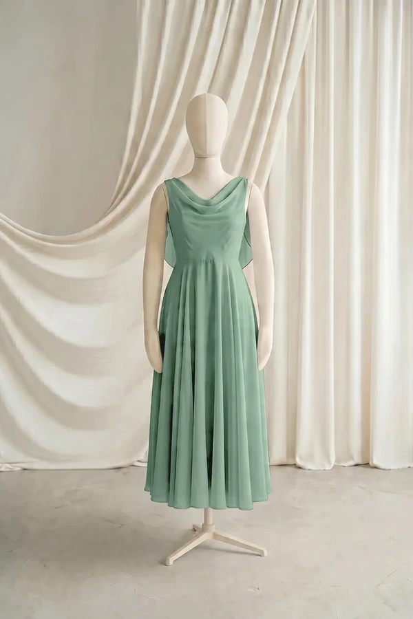 Athena Junior Bridesmaid Dress by TH&TH – Sage Green – Front Athena junior bridesmaid dress by TH&TH in Sage Green chiffon, full-length front view