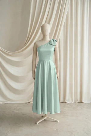 Mara junior bridesmaid dress by TH&TH in Dusty Eucalyptus, full-length front view