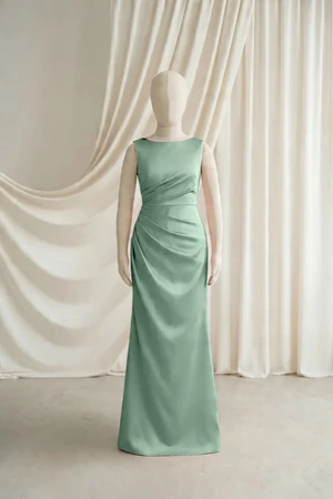 Sage Green Nala junior bridesmaid dress by TH&TH, satin boat neck, front view