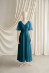 Phoebe junior bridesmaid dress by TH&TH in Emerald Dawn, full-length front view
