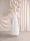 Phoebe junior bridesmaid dress by TH&TH in Ivory, full-length back view