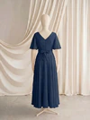 Phoebe junior bridesmaid dress by TH&TH in Navy, full-length back view