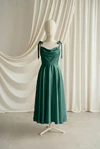 Tilly junior bridesmaid dress by TH&TH in Forest Green, full-length front view
