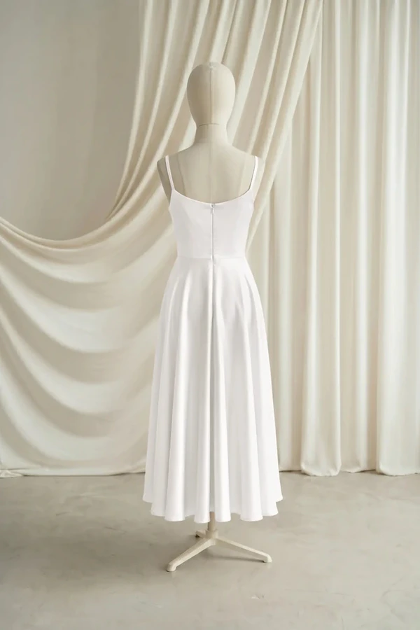 Tilly Junior Bridesmaid Dress by TH&TH – Neutral – Ivory – Back Tilly junior bridesmaid dress by TH&TH in Ivory, full-length back view