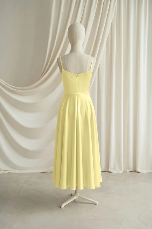 Tilly Junior Bridesmaid Dress by TH&TH – Yellow – Limoncello – Back Tilly junior bridesmaid dress by TH&TH in Limoncello, full-length back view